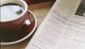 Coffee and newspaper for reading roundup post